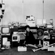 A model sits among the many different electrical appliances manufactured by the Mitsubishi Electric Co. in Japan